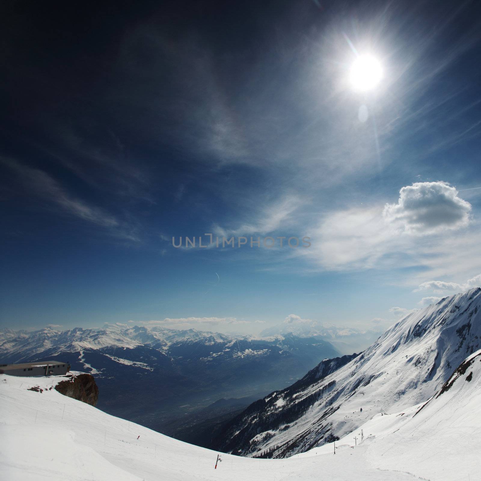 top of mountains in blue sky