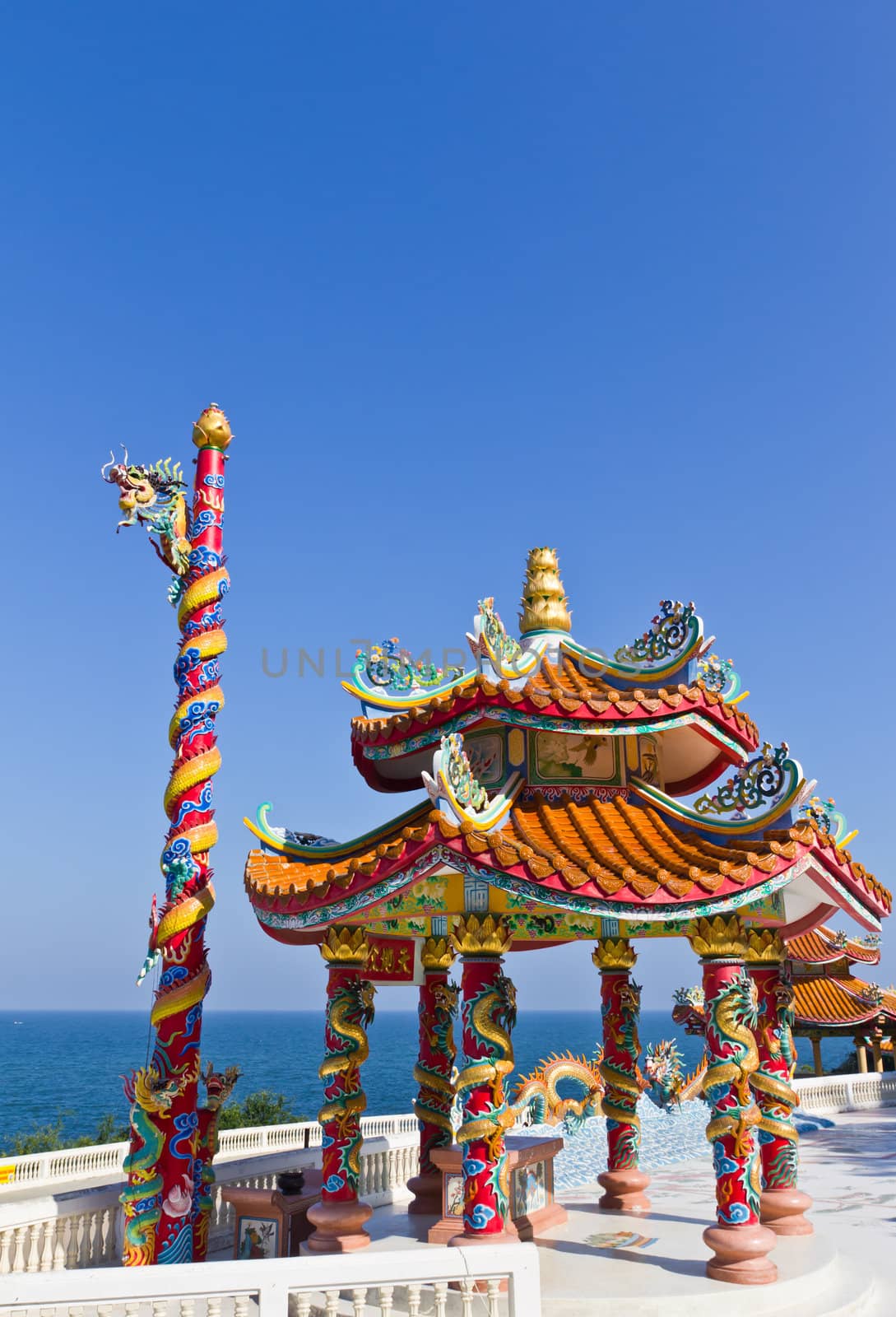 dragon pavilion against blue sky in chinese temple