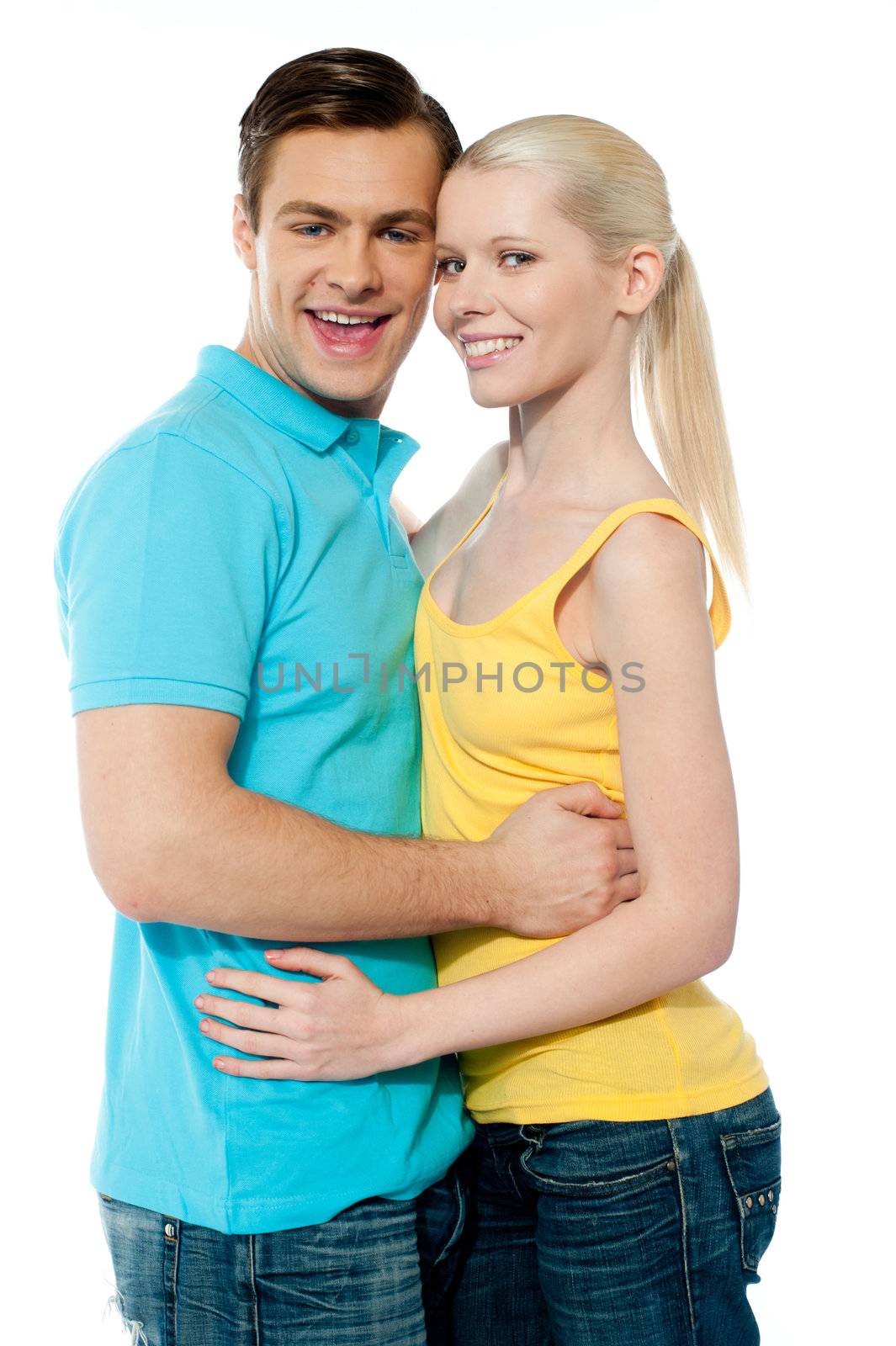 Girlfriend boyfriend hugging each other on white background