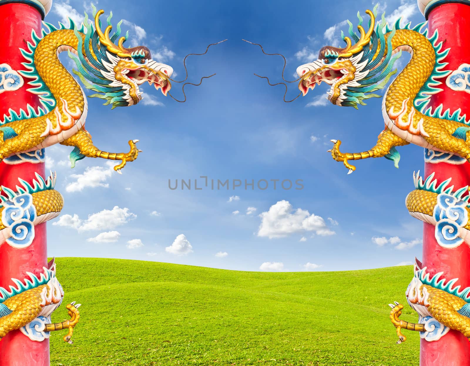 dragon statue against blue sky by tungphoto