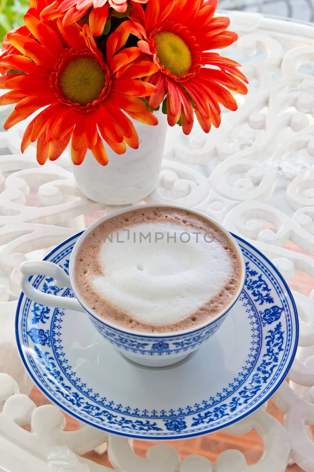 cup of hot chocolate and flower