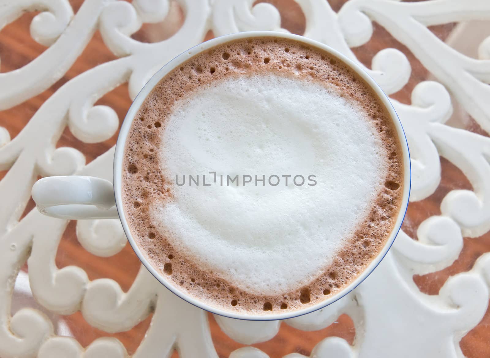 hot chocolate in white cup by tungphoto