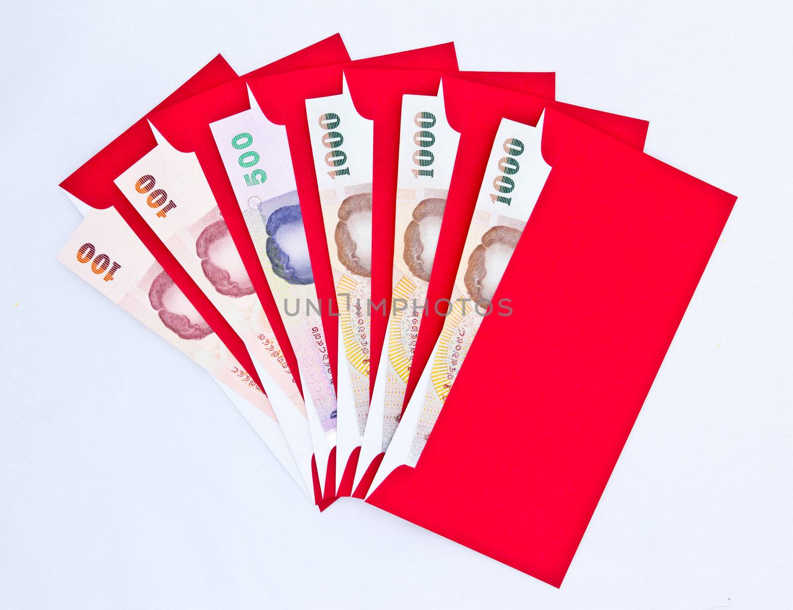 money in red envelope for give to people on chinese new year by tungphoto