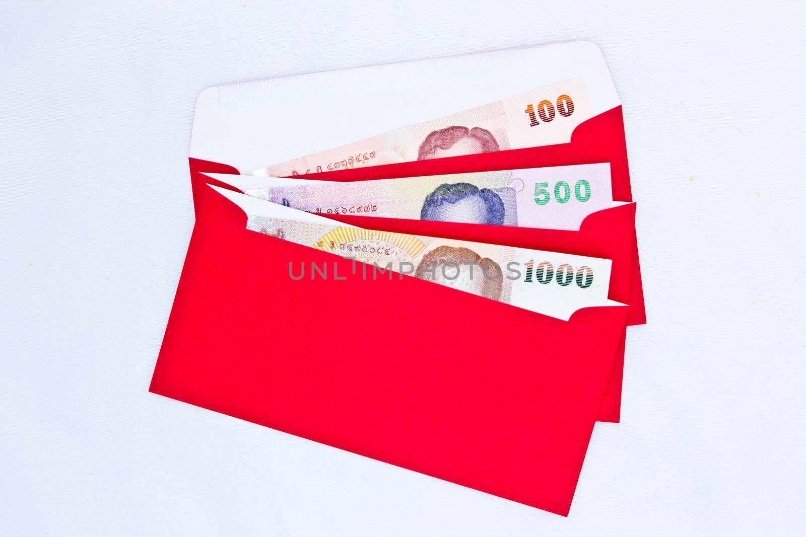 money in red envelope for give to people on chinese new year by tungphoto