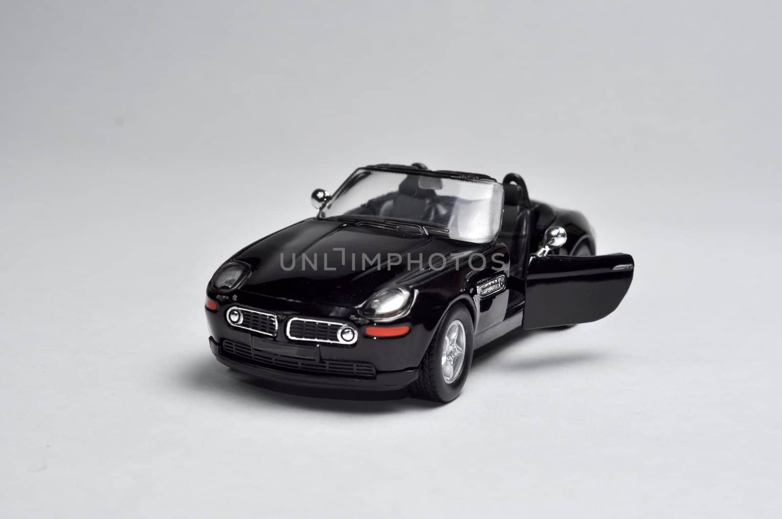Black sport car on white