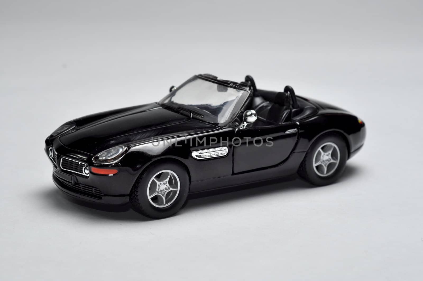 Black sport car on white