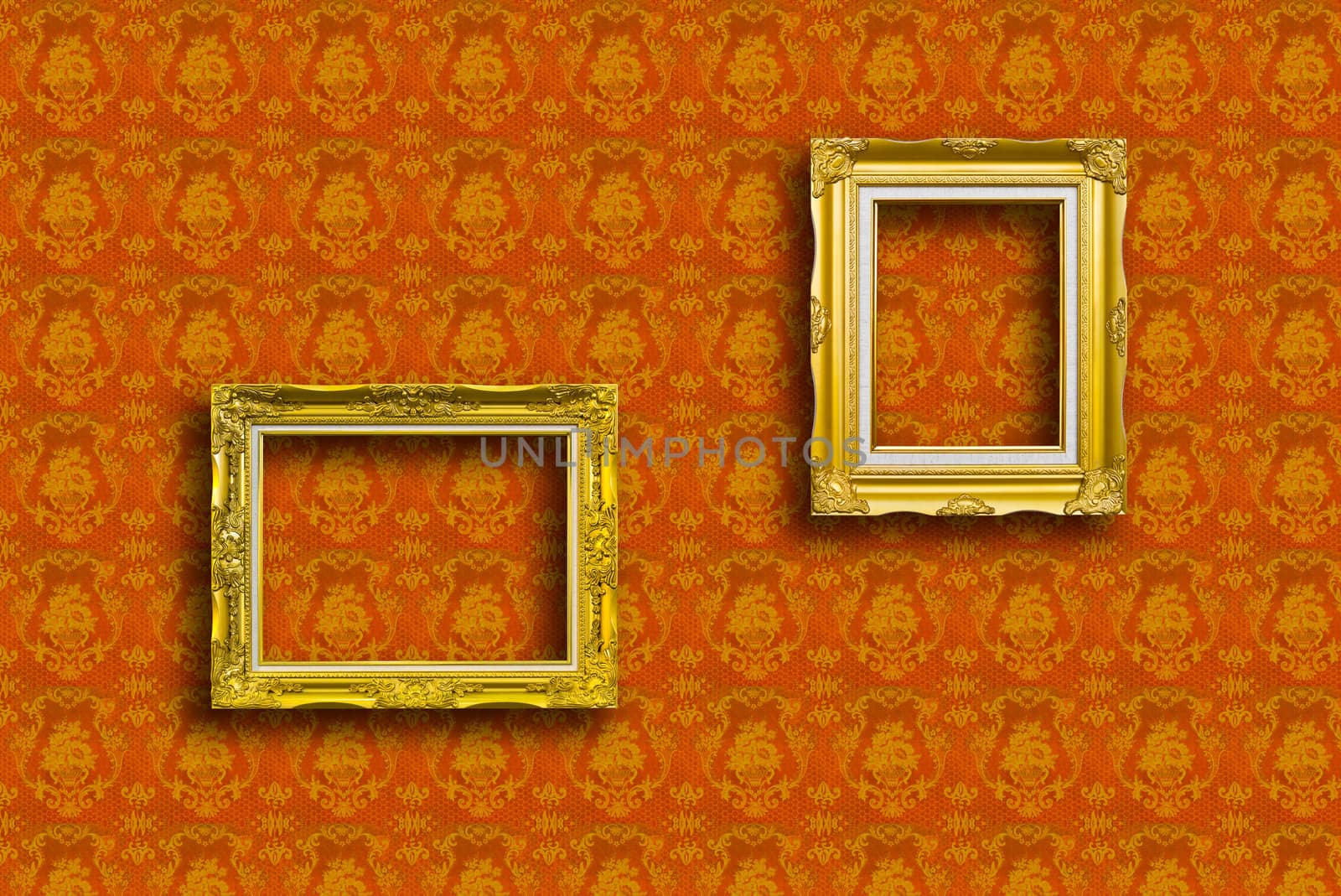 frame of golden wood  on yellow wallpaper