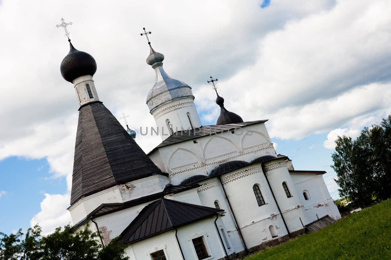 White orthodox church in Ferapontov monastery in summer day
