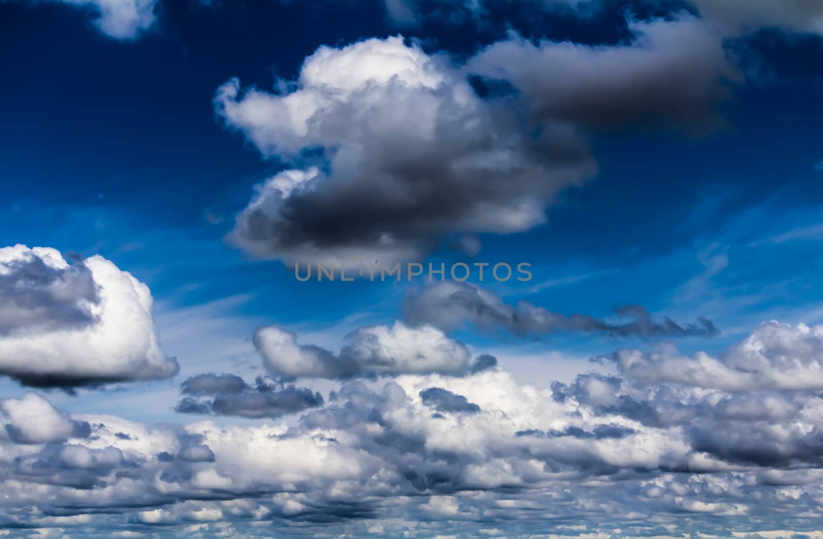 Cumulus clouds by petkolophoto