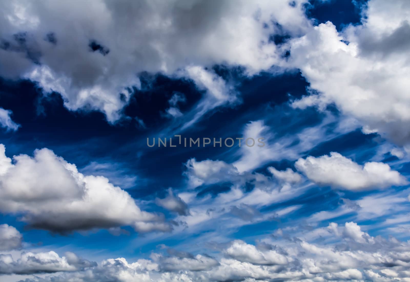 Cumulus clouds by petkolophoto