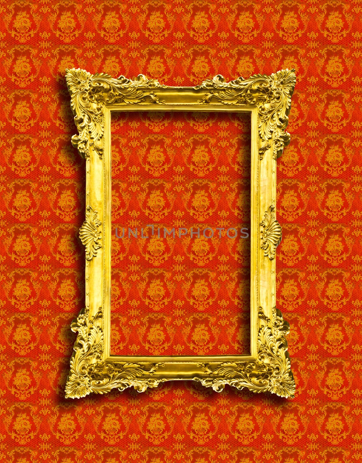 frame of golden wood  on yellow wallpaper