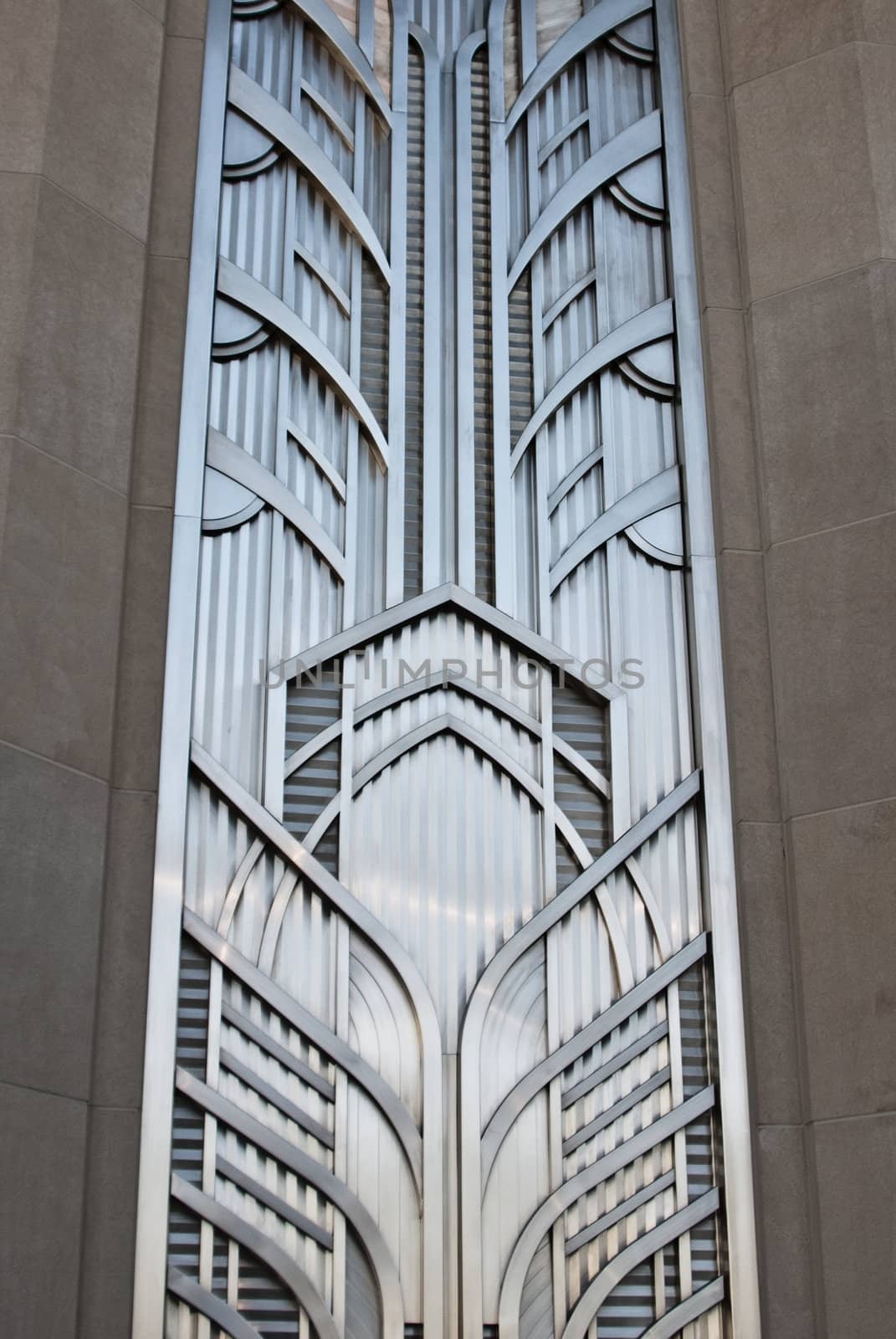 Panel of silver metal work in lieu of window