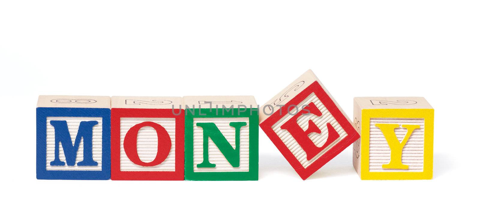 Alphabet blocks arranged to spell the word, "money."  Isolated on white with clipping path.