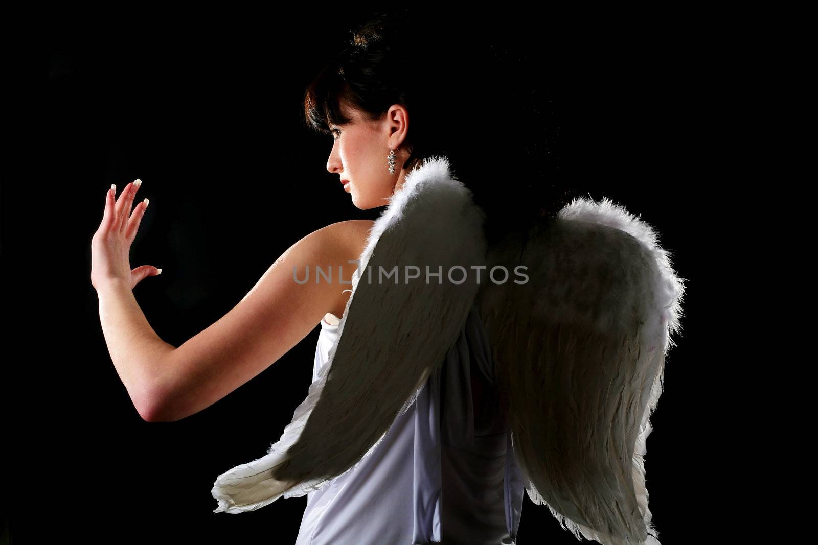 An image of a girl dressed like an angel