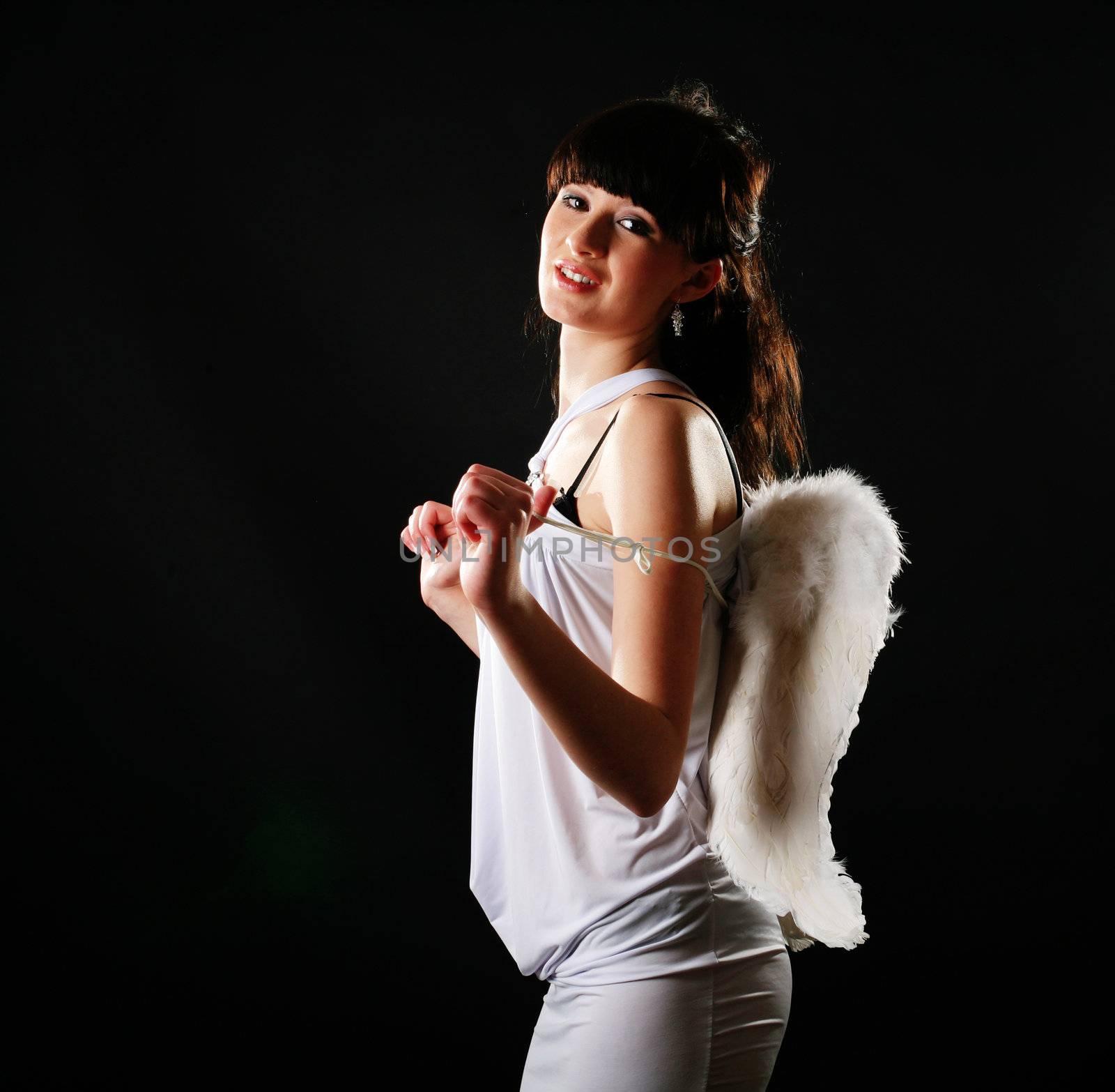 An image of a girl dressed like an angel