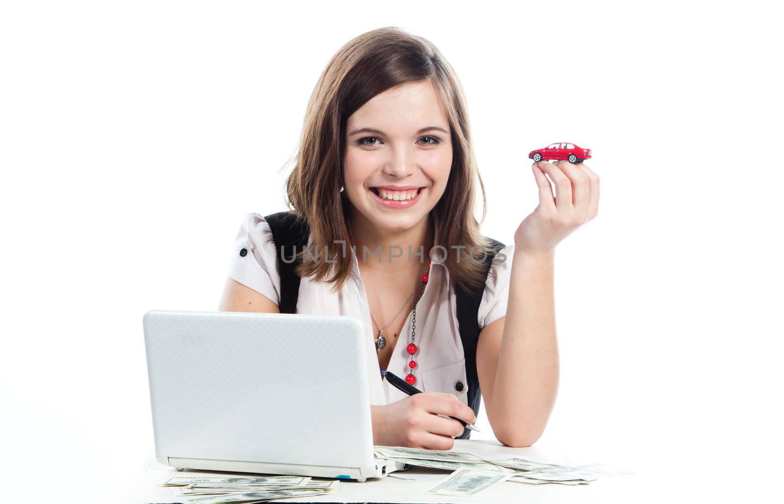 portrait of a young manager for motor with a small red toy car
