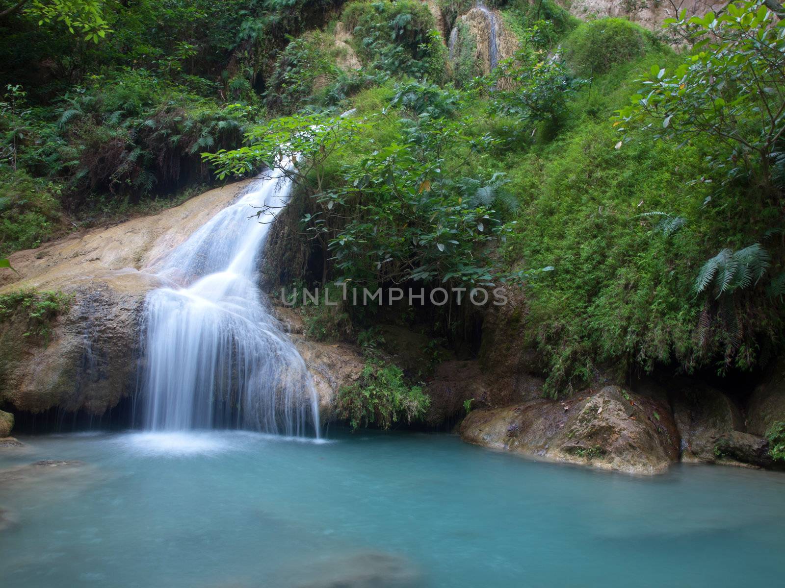 Emerald color water in tier seventh of Erawan waterfall, Erawan National Park, Kanchanaburi, Thailand