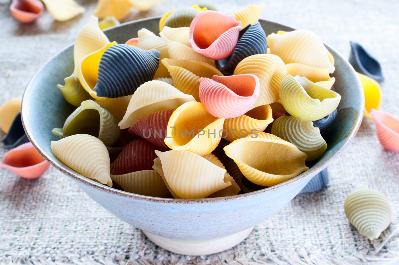 Multi colored pasta close up by Nanisimova