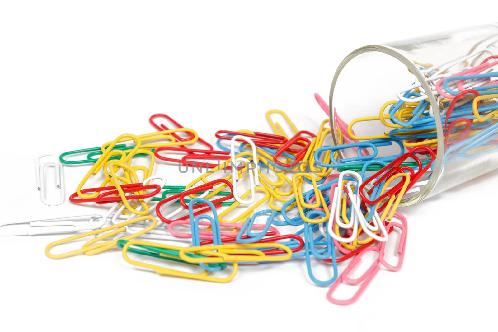 color paperclip spilled on the white background