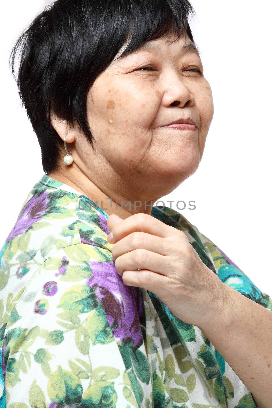 senior woman holding her aching back  by cozyta