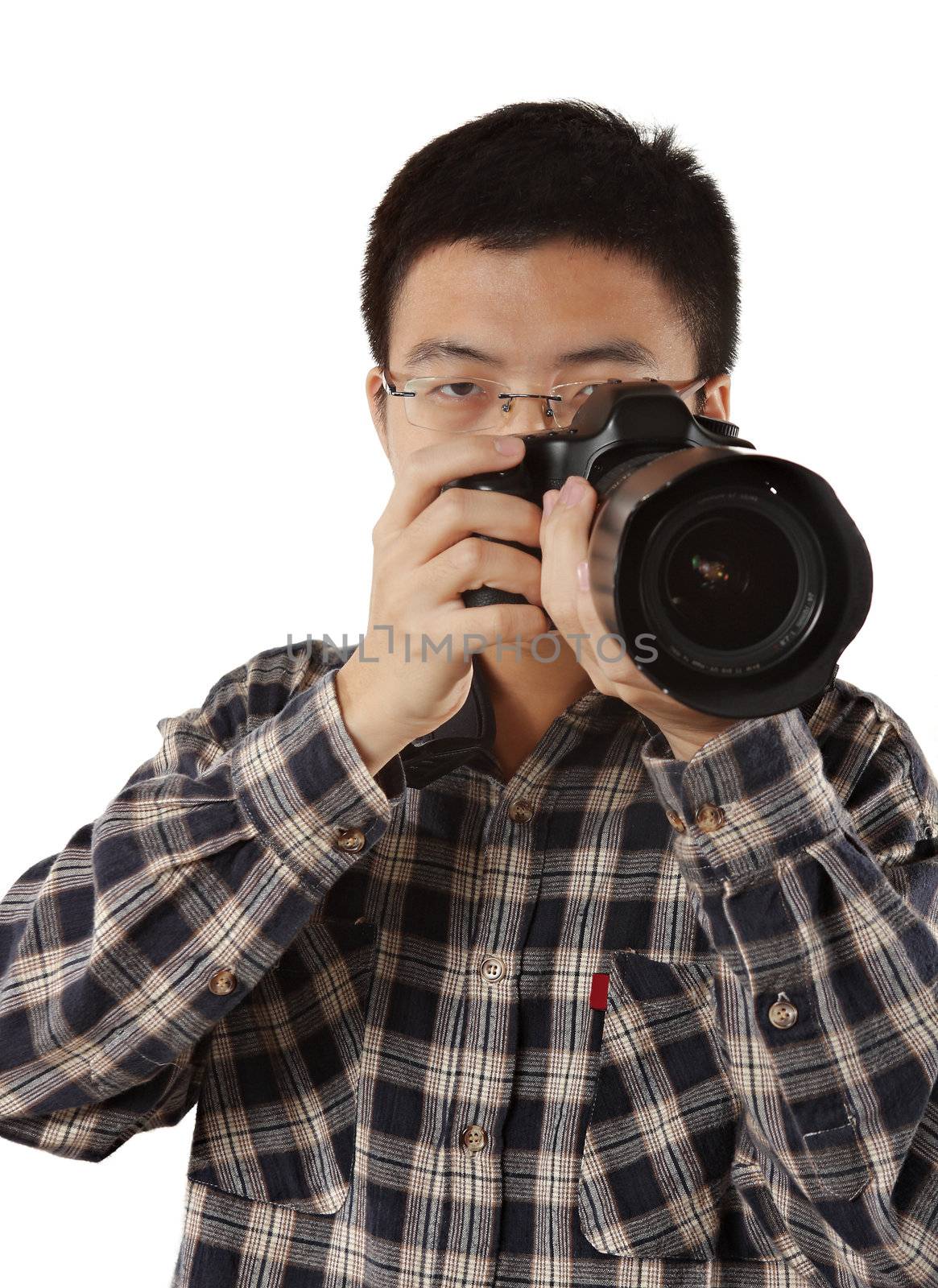 Male photographer holding camera by cozyta