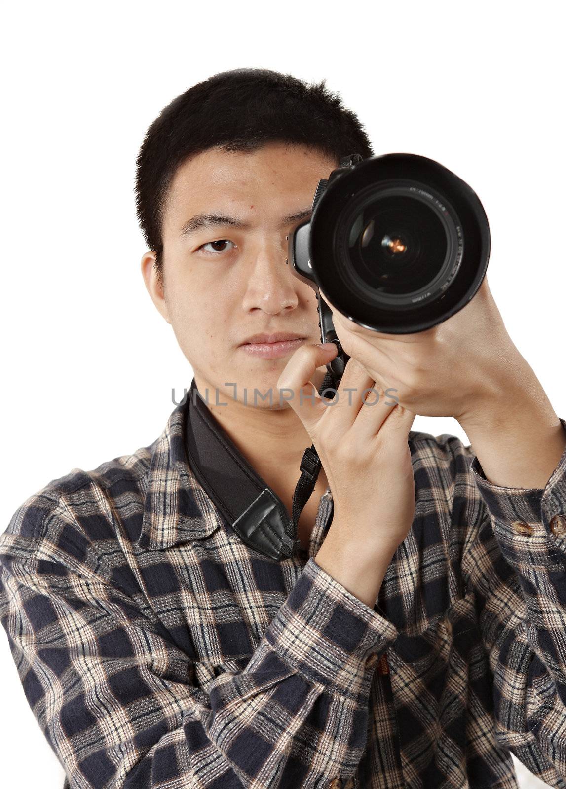 Male photographer holding camera