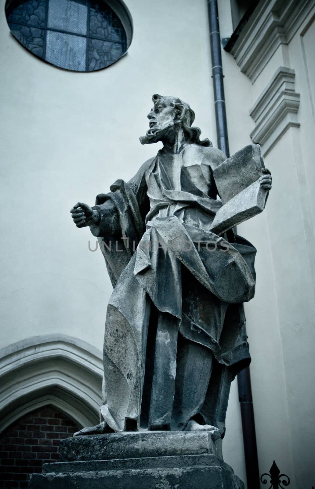 statue with book near Latin Cathedral, Lviv