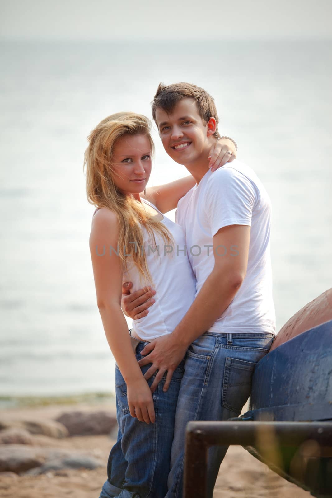 couple on a beach by petr_malyshev