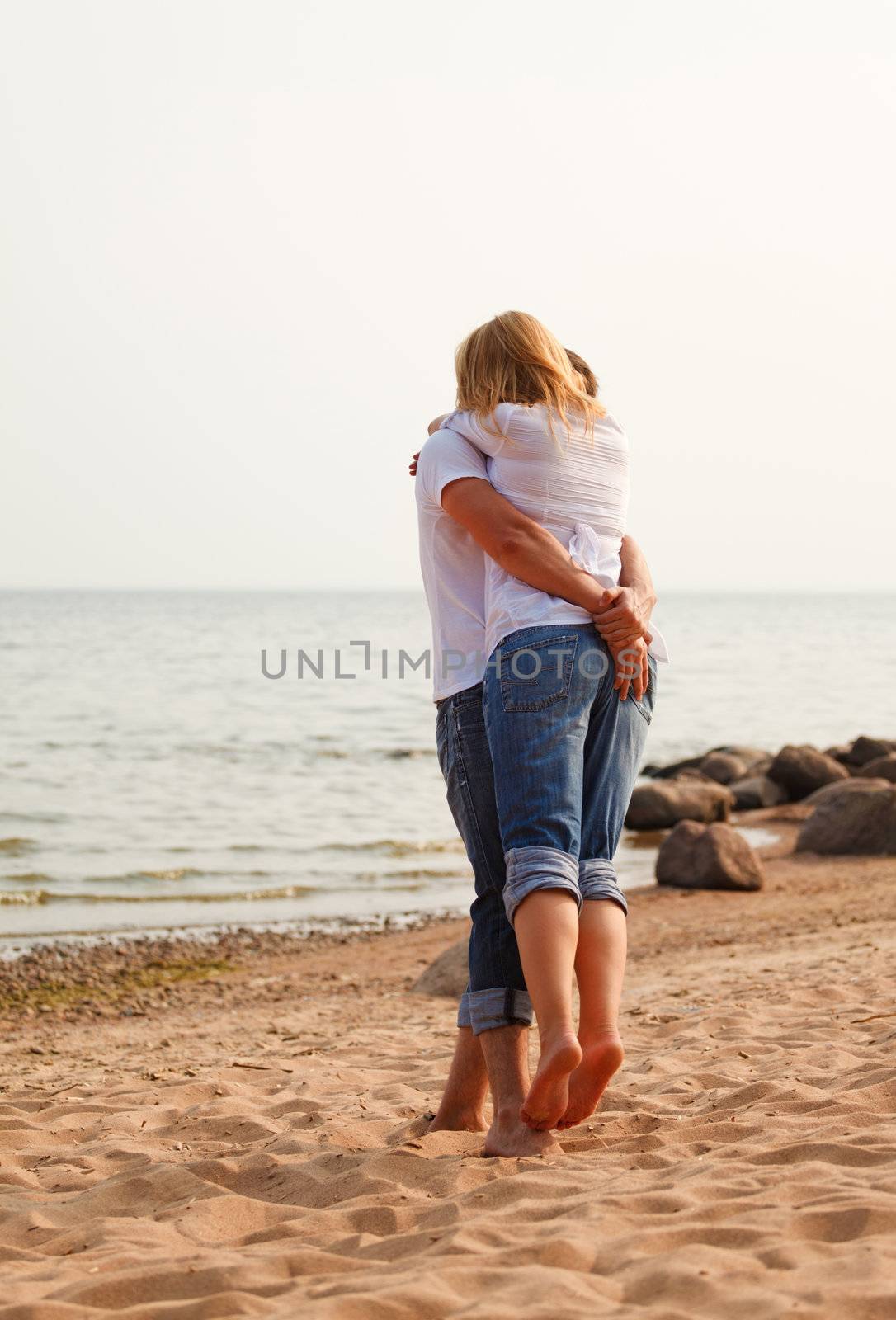 beautiful couple fun on a beach