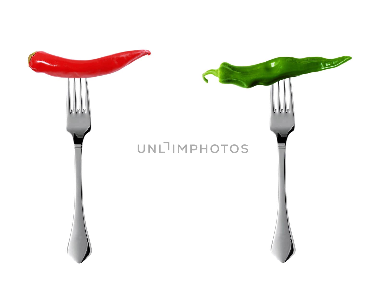 Red hot chili pepper with yellow green pepper pricked on forks isolated on white