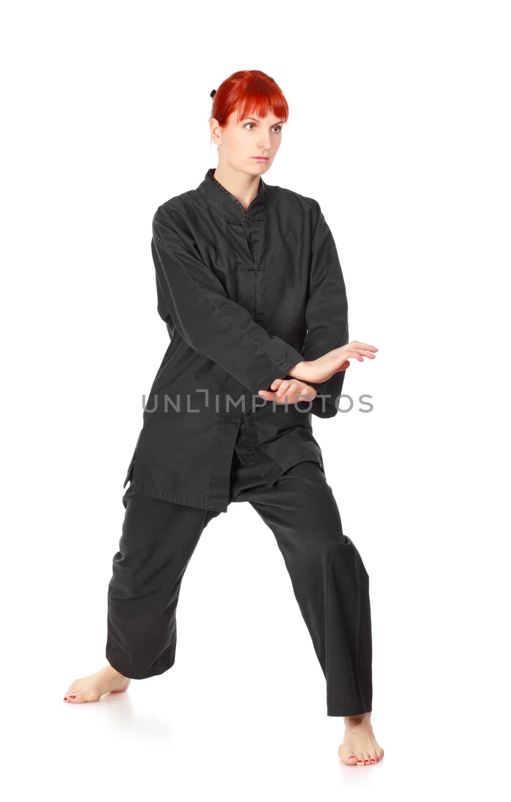 girl in black kimono exercise, isolated on white