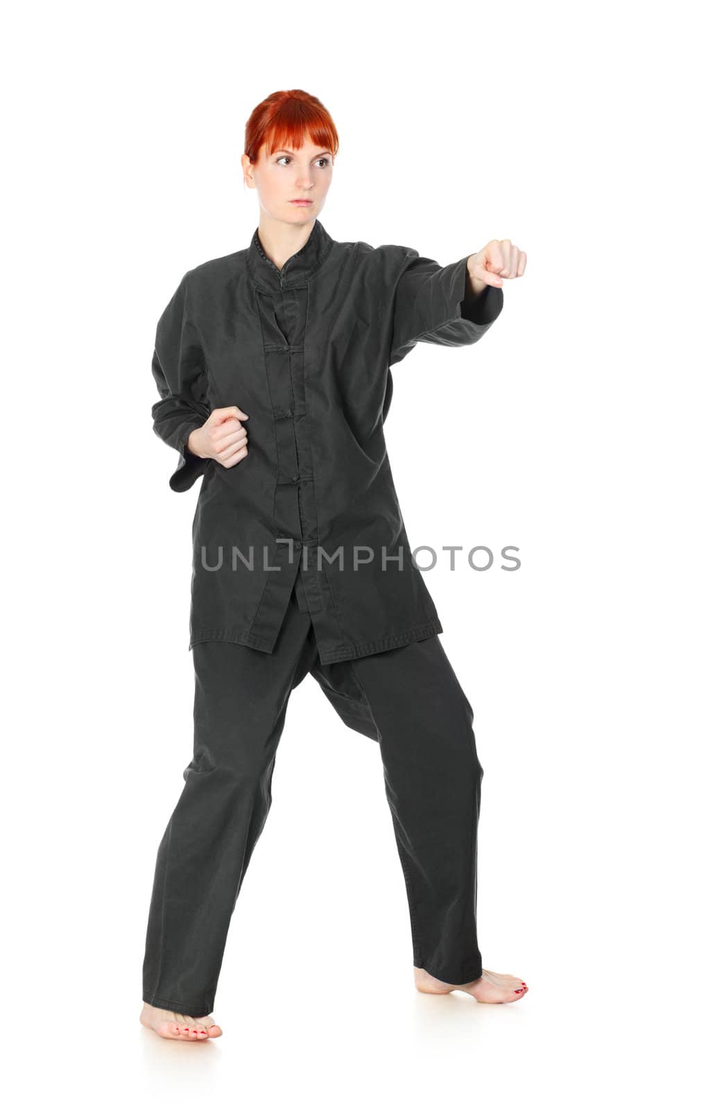 girl in black kimono exercise, isolated on white