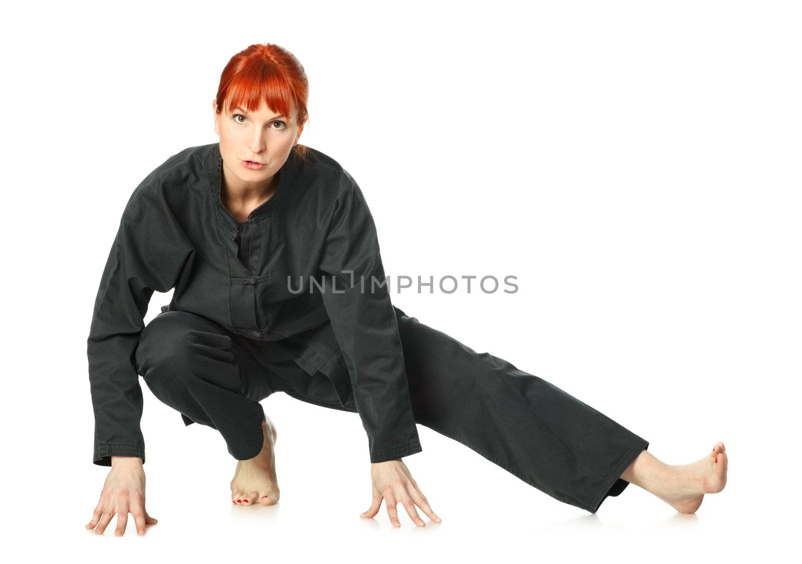 girl in black kimono exercise, isolated on white