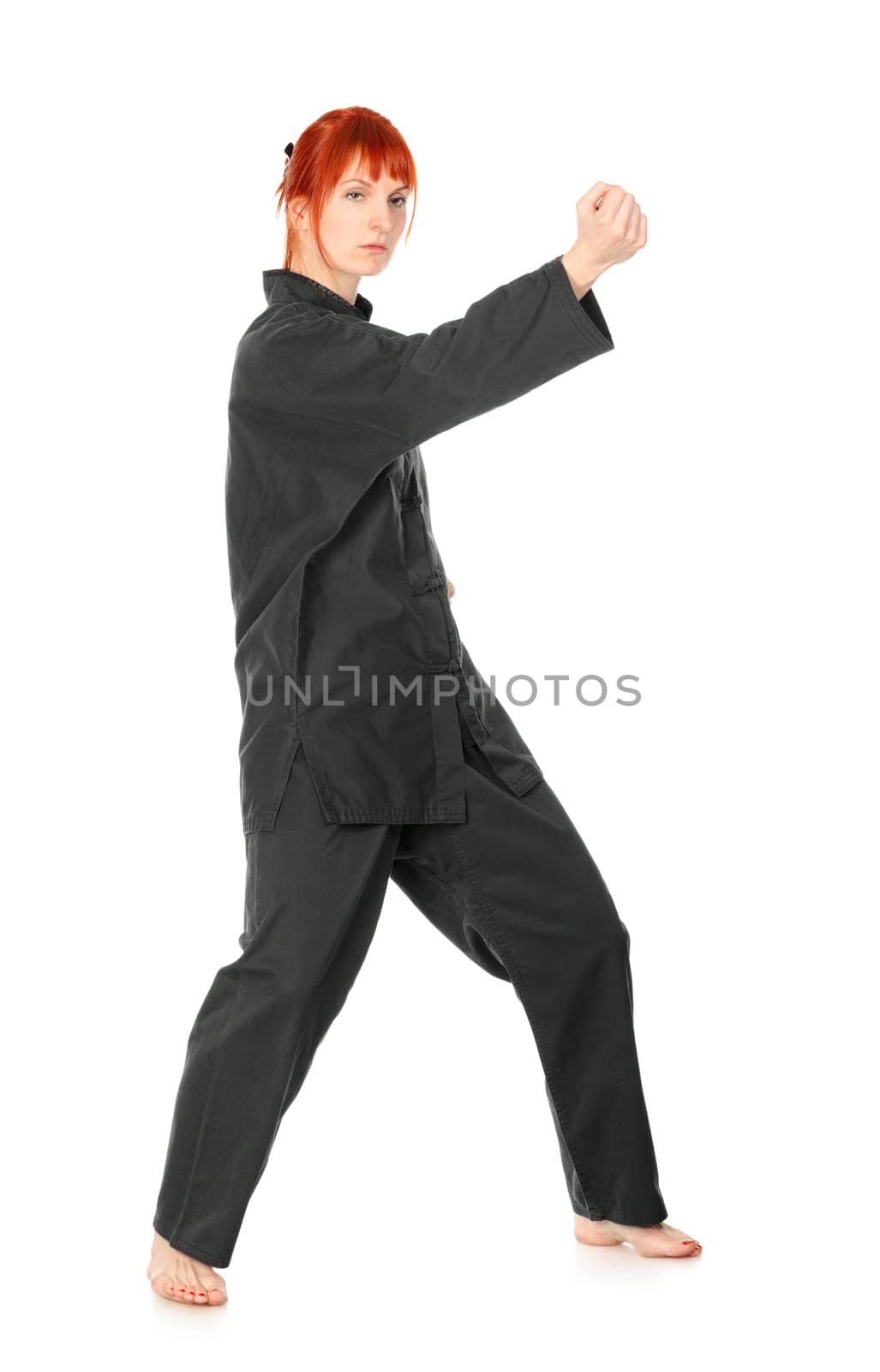 girl in black kimono exercise, isolated on white