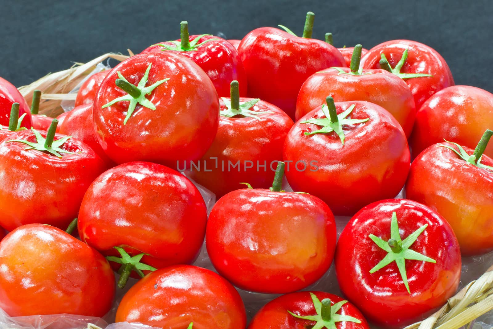 pile of tomato in bamboo basket