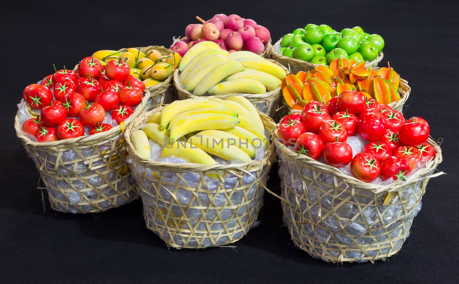 variety of fruit in bamboo basket by tungphoto