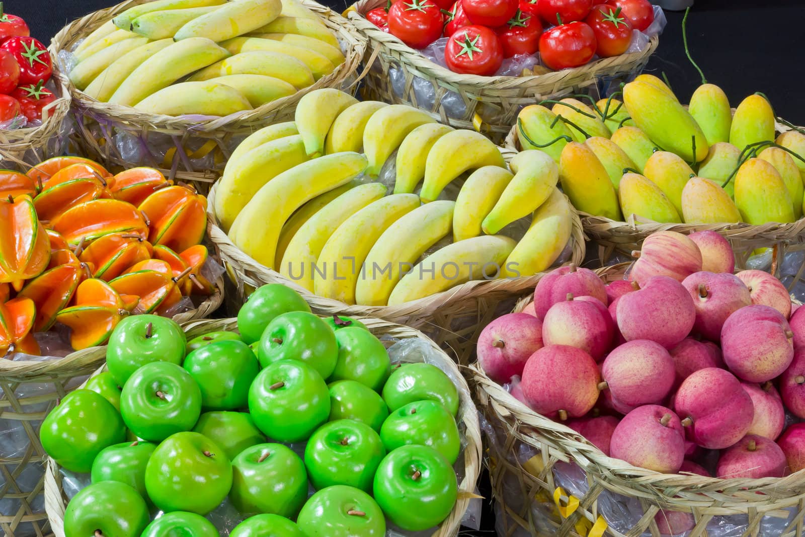 variety of fruit in bamboo basket by tungphoto