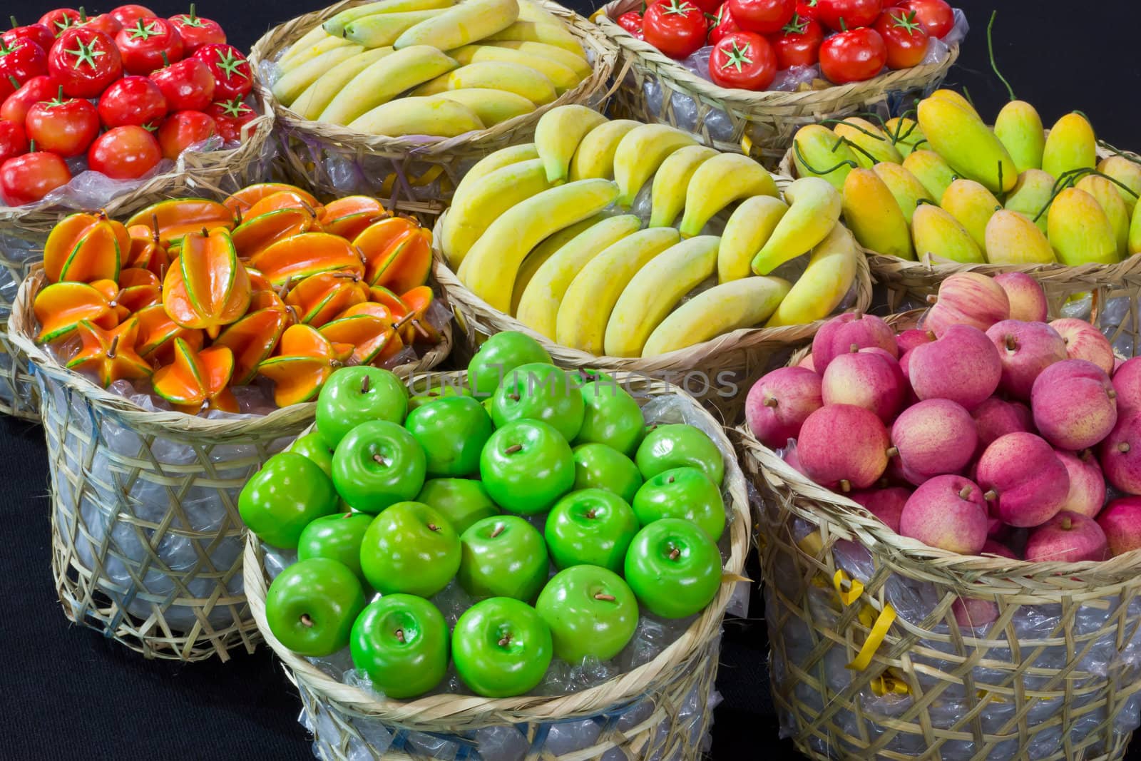 variety of fruit in bamboo basket by tungphoto