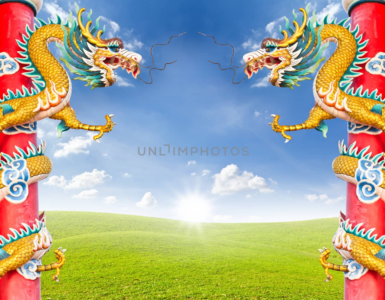 dragon statue against blue sky by tungphoto