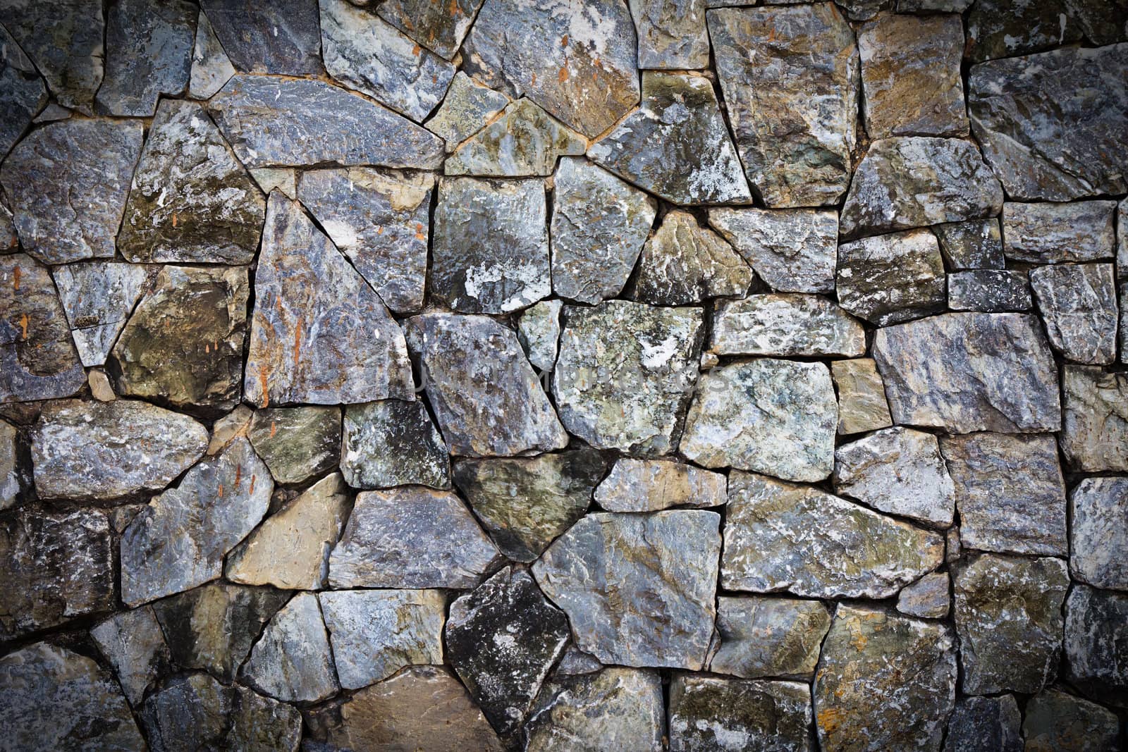 texture of stone wall for background by tungphoto