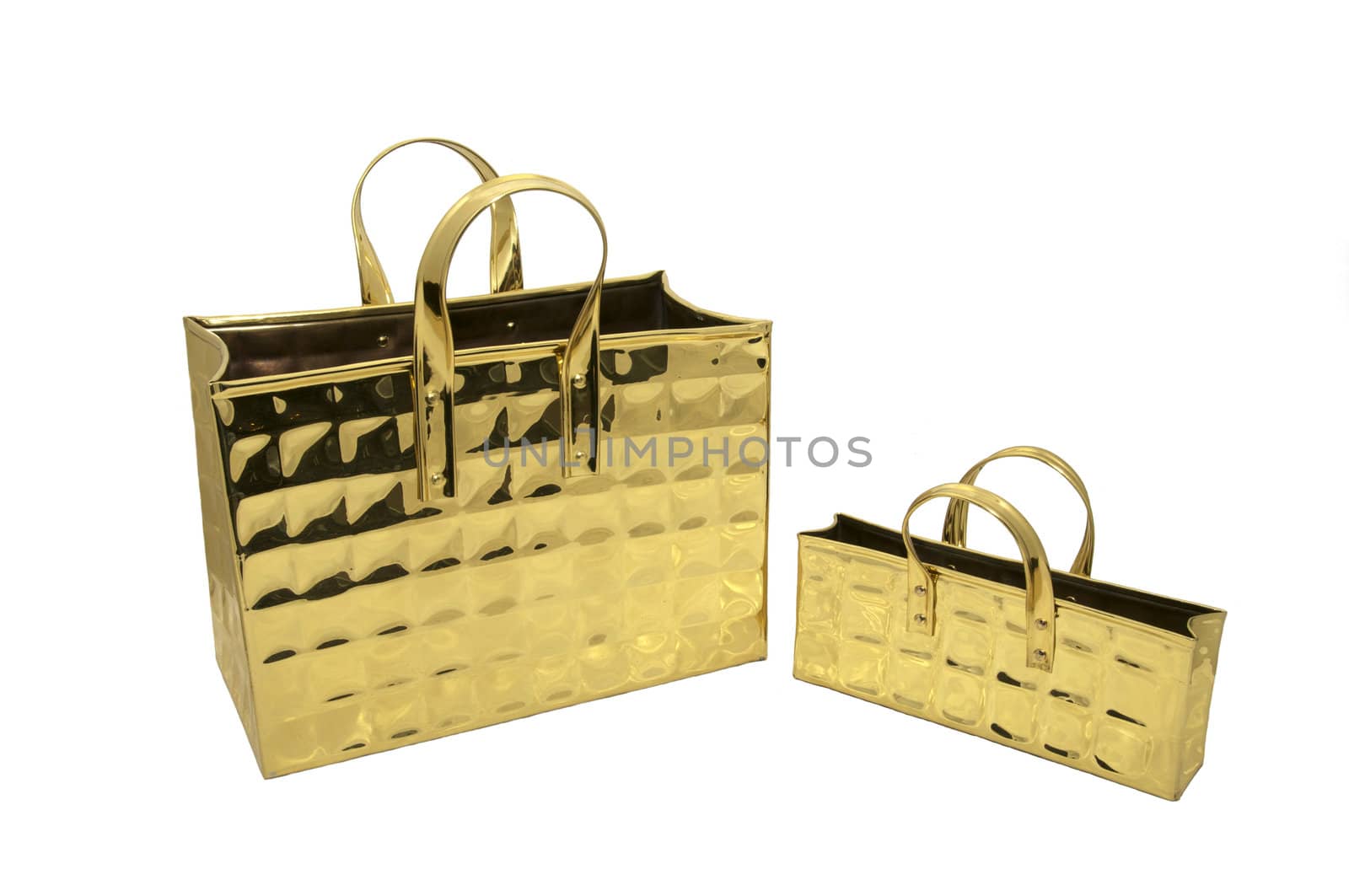 two brass decorative bags on white background