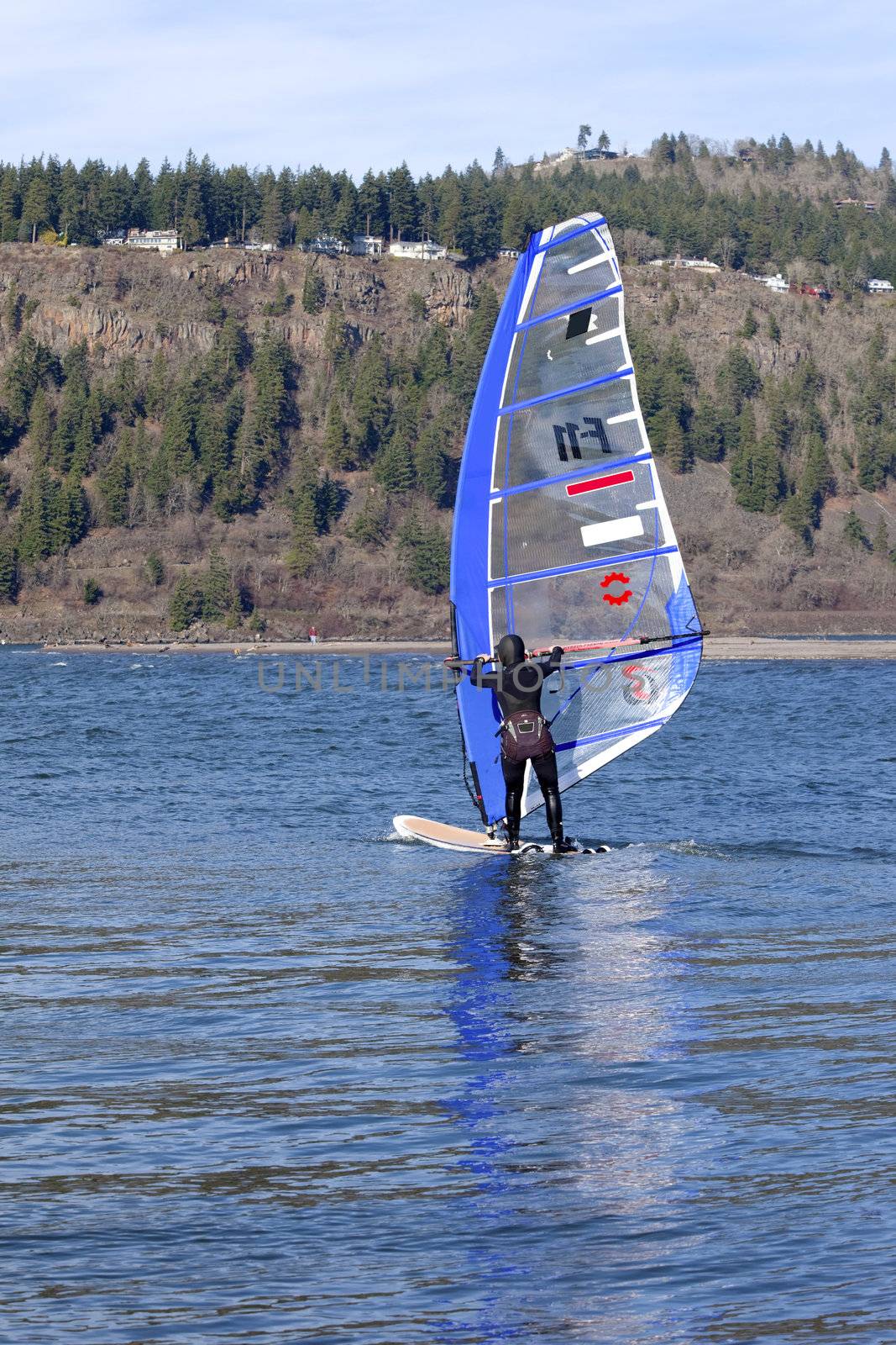 Wind surfing in Hood River Oregon. by Rigucci