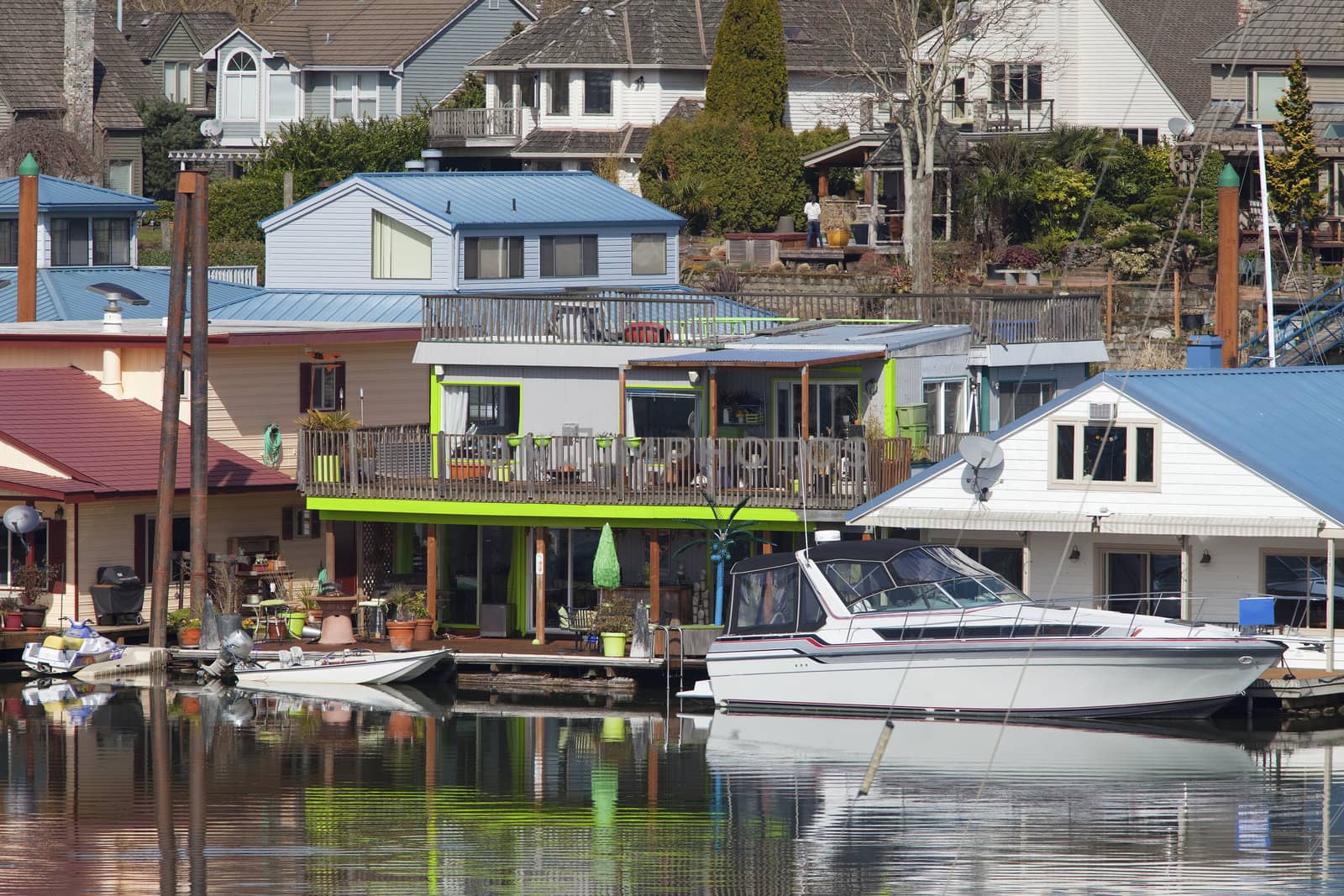 Two level floating house and a power boat, Portland OR.