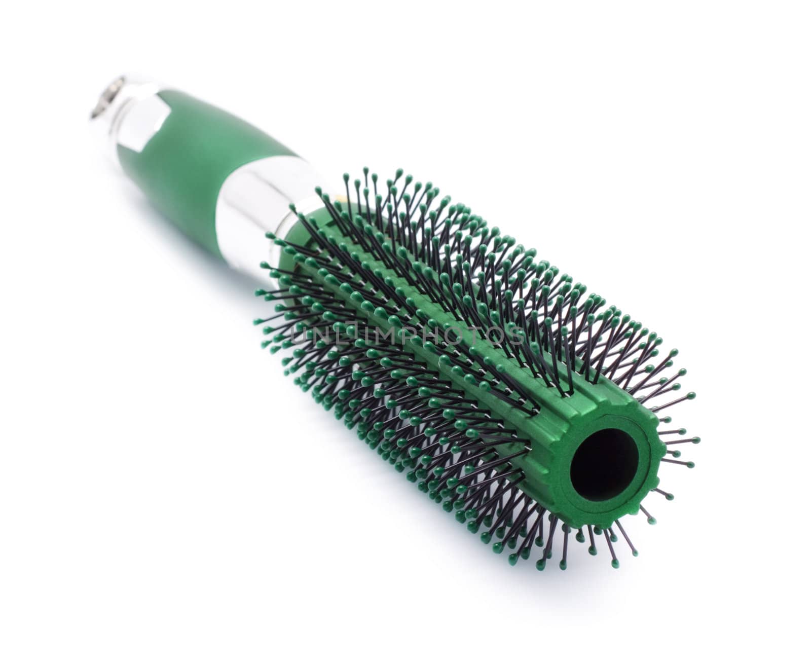 green hair brush isolated on white background
