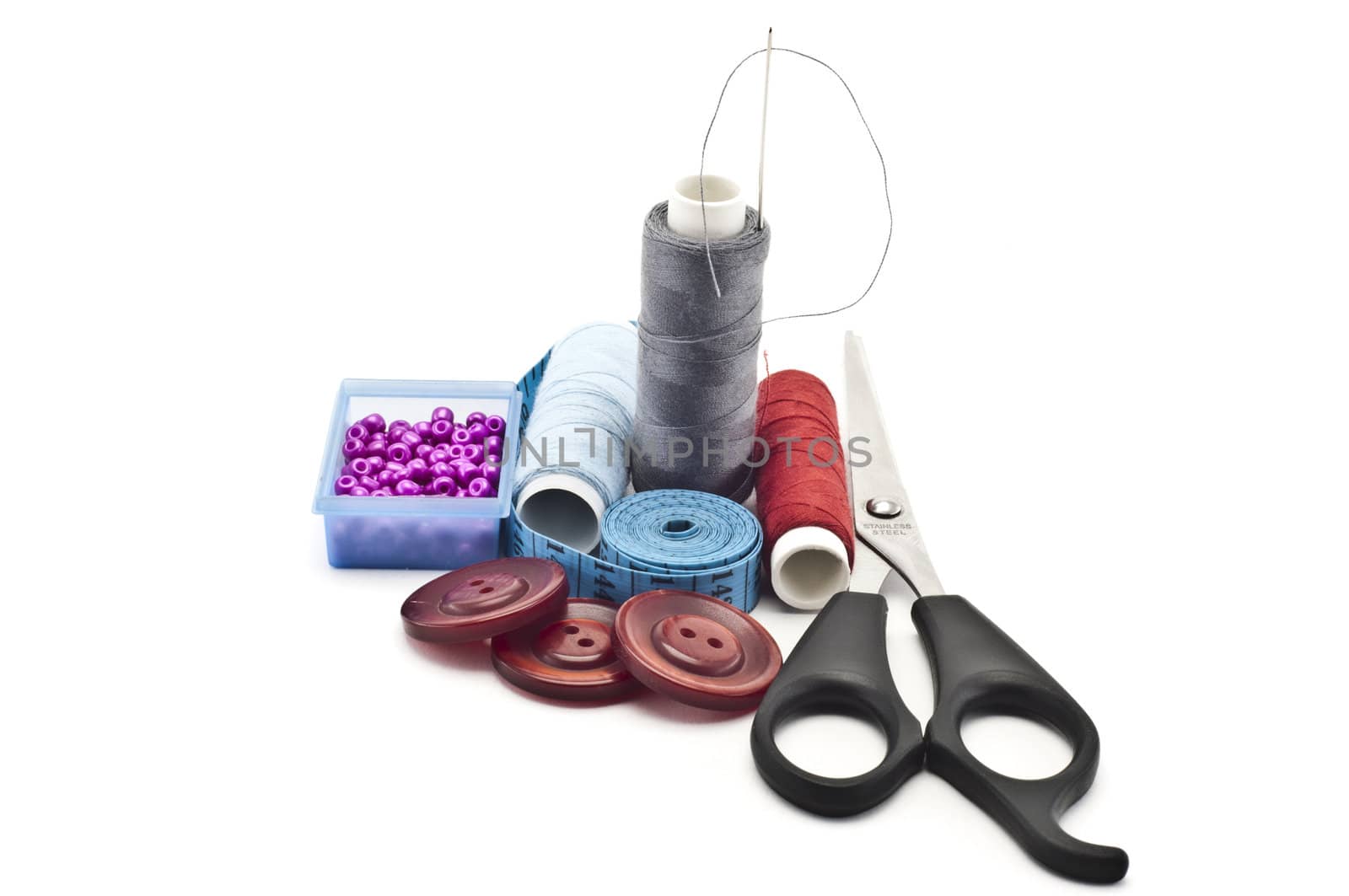 Sewing accessories on a white background