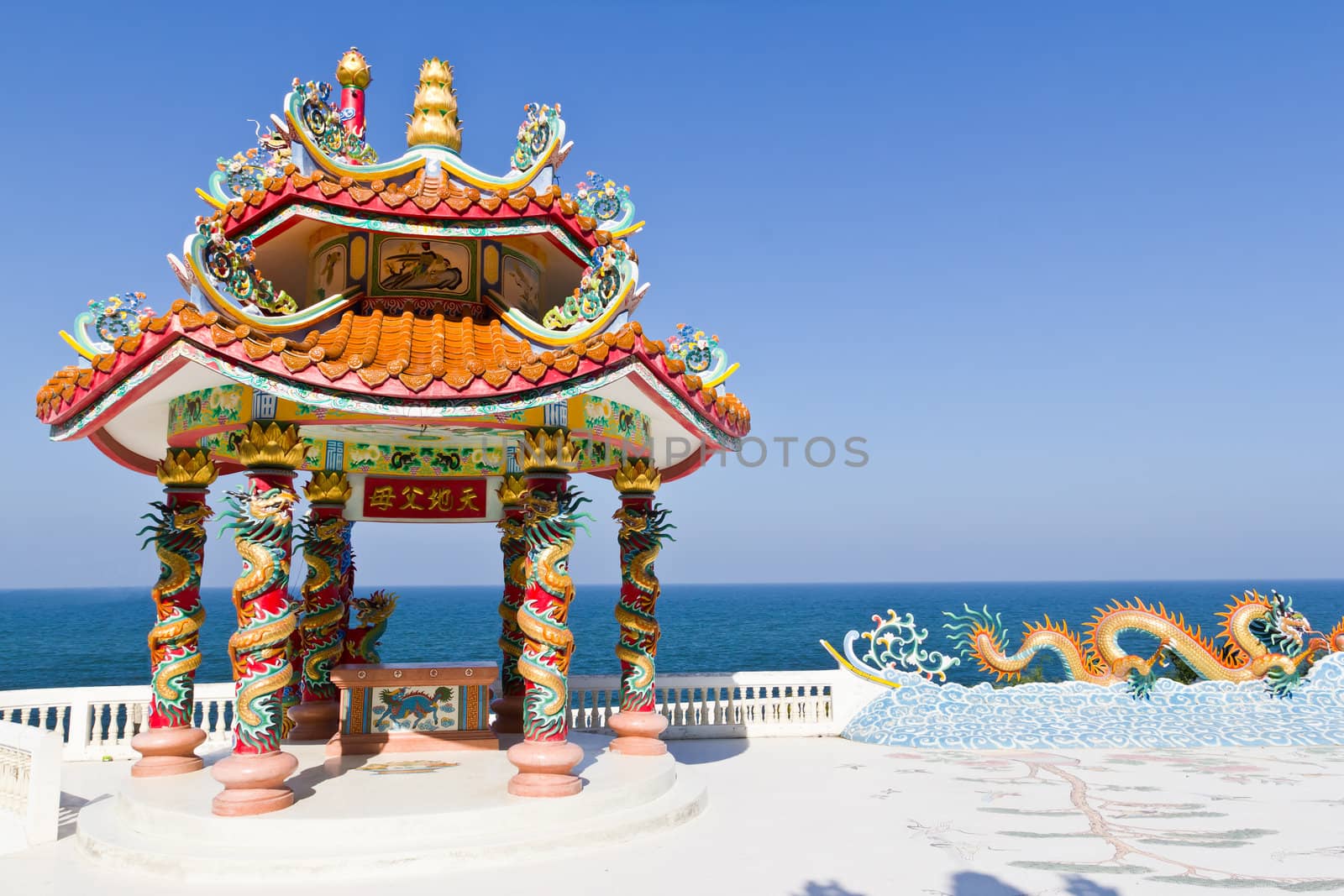 dragon pavilion against blue sky in chinese temple