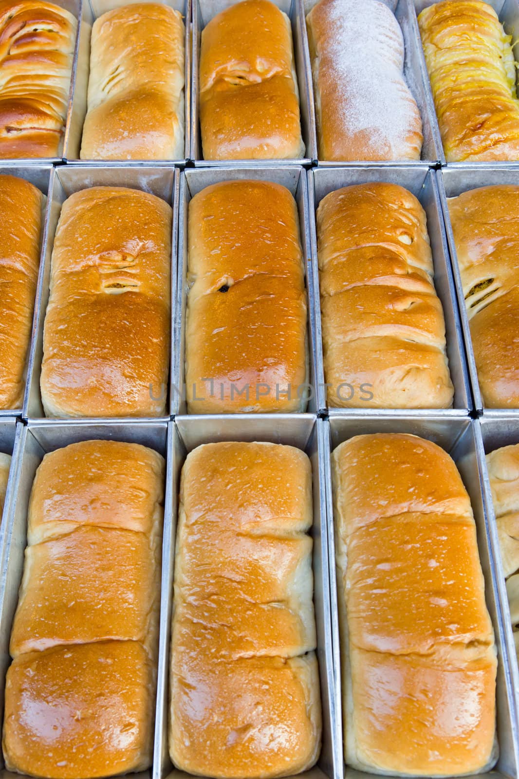 row of bread in metal box
