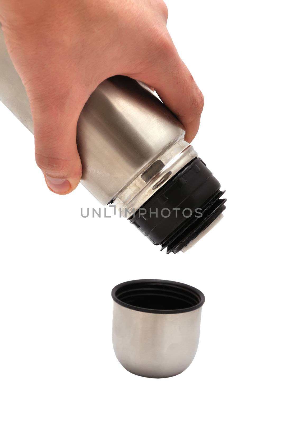 metal thermos in hand  on a white background
