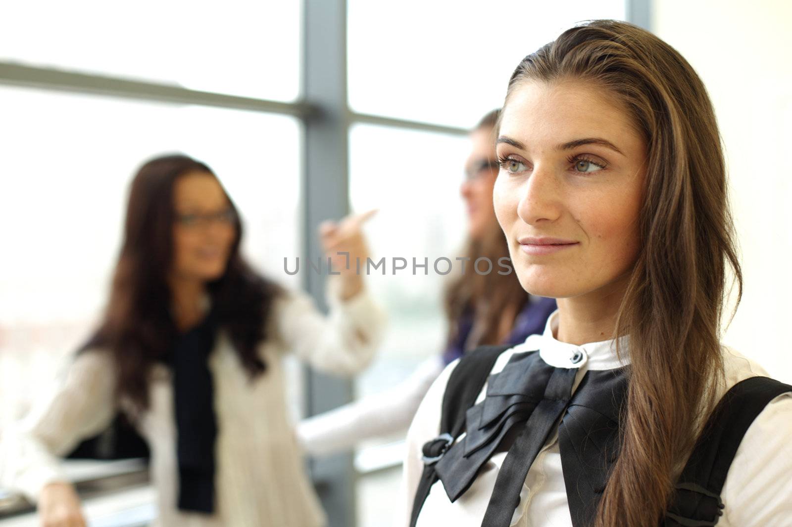 Student meeting smiley girl face on foreground 