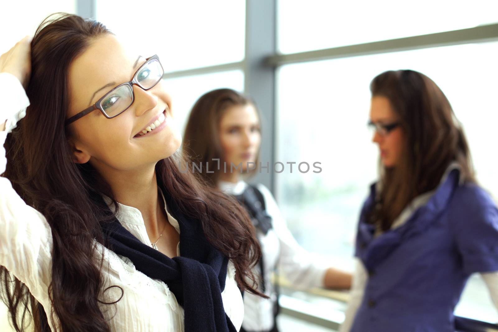 Student meeting smiley girl face on foreground 